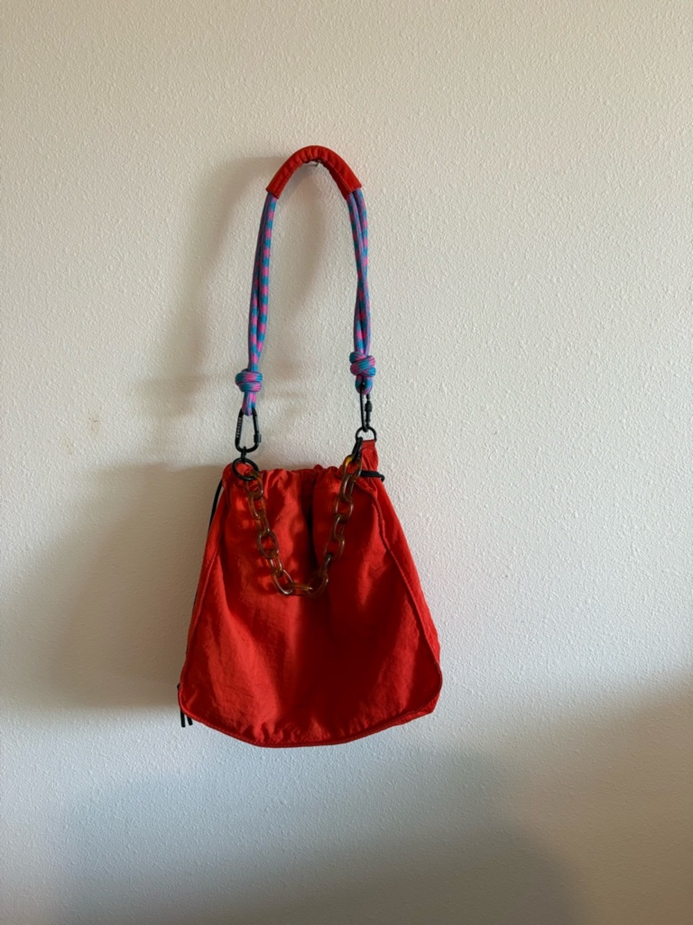 Red Drawstring Shoulder Bag with Tortoiseshell Chain and Colorful Strap - Picture 4 of 15